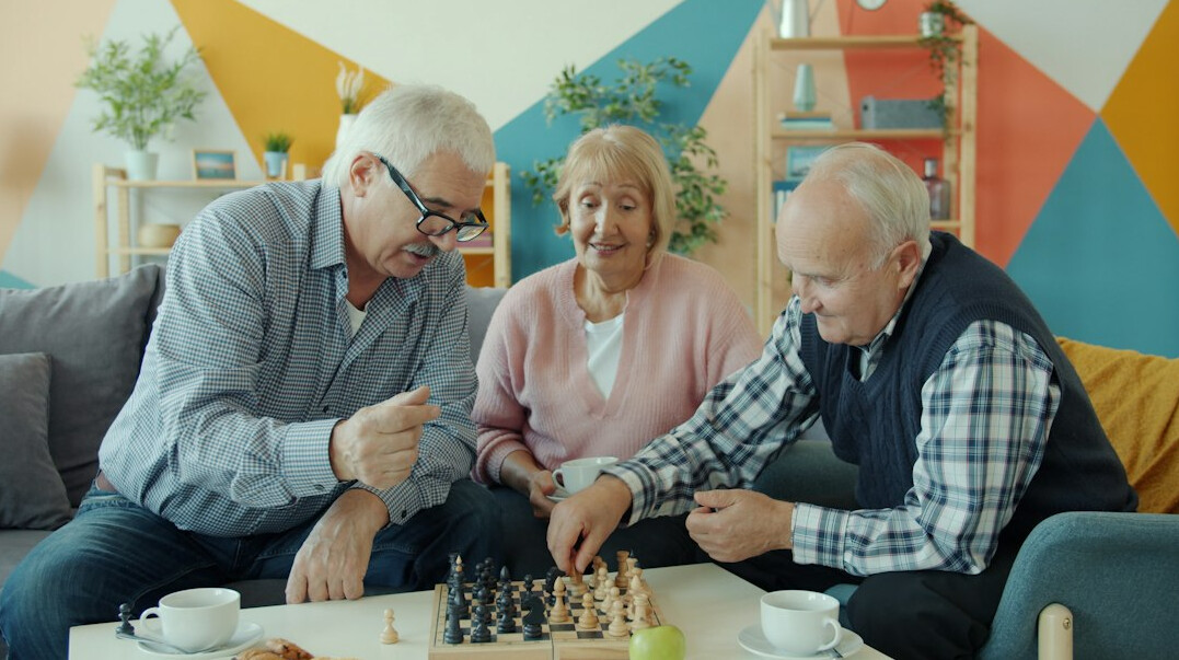 elderly group playing board games