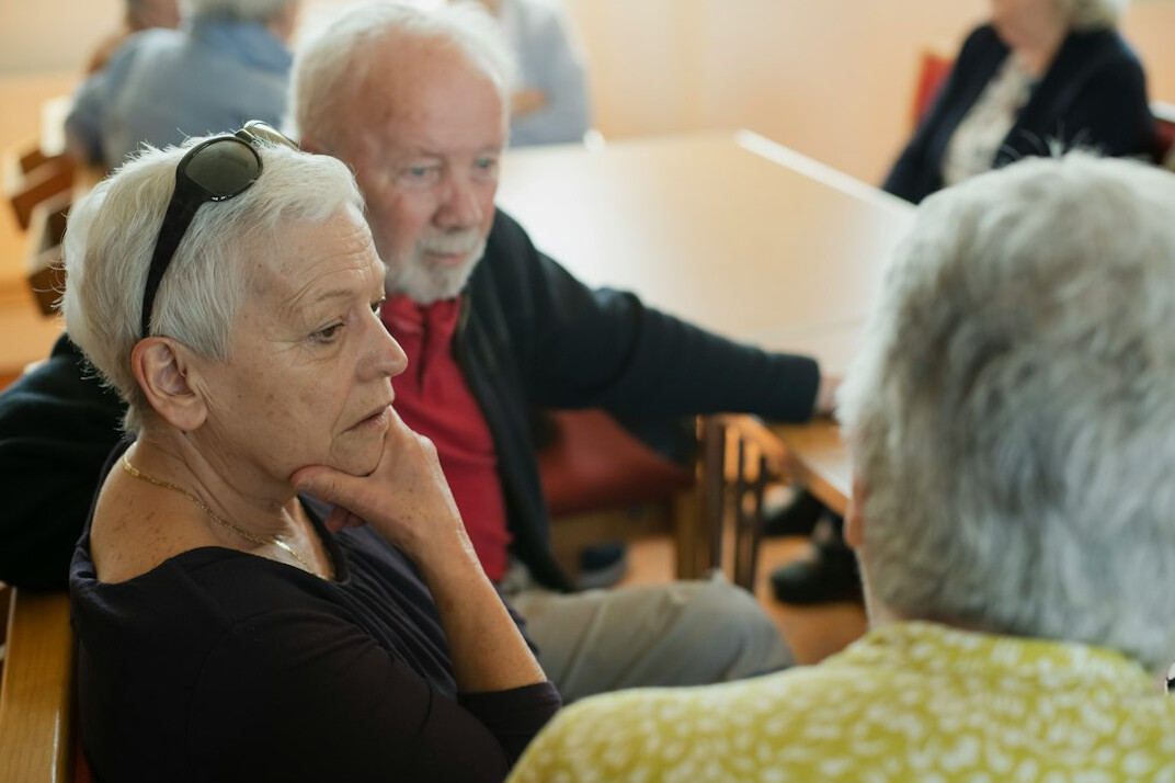 group of seniors chatting warmly